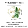 Waterdichte WC muursticker met groene monstera bladeren en gouden belettering - 30x30cm