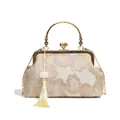 Elegant champagne silk floral embroidery handbag with vintage metal handle and long tassel - White