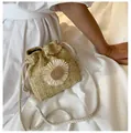 Straw bucket bag in natural wood color with large white sunflower detail and drawstring - Large Flower Khaki