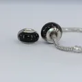 Macro shot showing 925 silver stamp on black glass bubble charm beads for DIY bracelets - Black (HZ-07)