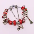 Christmas charm bracelet with red glass beads, Santa and tree pendants on silver snake chain - 16cm