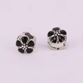 Detail of vintage-style flower beads with black enamel and silver-colored metal alloy core - Black