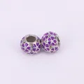 Silver bead charm with purple enamel hearts and sparkling zircon stones on white background - Purple