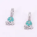Macro detail of cherry blossom pendants with teal enamel and sparkling rhinestones - Sky Blue