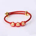 Detail of red woven Dragon Boat Festival bracelet with three cute enamel charm beads - Red Rope + 3 Red Rice Dumplings