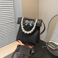 Bolso bandolera negro chic con asa de perlas y lazo plateado para mujer moda - Negro