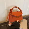 Caramel pebble leather small square bag with decorative knotted handle and flap - Brown