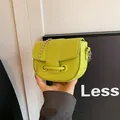 Lime green saddle bag with silver beaded chain and pebble grain faux leather - Green