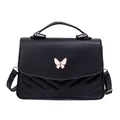 Black vegan leather crossbody bag with butterfly buckle and V-shaped quilted pattern - Black