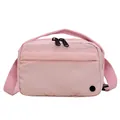 Lightweight pink nylon crossbody bag with dual zippers and front pocket for casual use - Pink