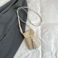 Beige woven straw mobile phone crossbody bag with tassel detail and metal buckle strap - White