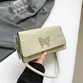 Fashionable sage green shoulder bag with pleated texture and silver butterfly ornament - Green