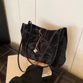 Elegant black velvet tote bag with bamboo leaf pattern and brown rope knot accessory - Black