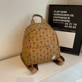 Khaki brown mini backpack featuring dark letter prints and a silver rabbit charm detail - No Pendant / Brown