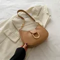 Brown faux leather hobo bag with a stylish gold D-shaped buckle and chain strap - Khaki