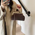 Braune Abendtasche aus Samt mit Strasssteinen und elegantem goldenem Metallgriff - Braun
