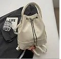 White ruched drawstring bucket bag with litchi grain finish and silver hardware - Off White
