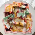 Detailed close-up of silk-like floral square scarf with oil painting floral patterns - Light Yellow