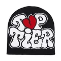 Close-up of knit texture with TOP TIER jacquard lettering and red broken heart on black beanie - Black Background Red Heart