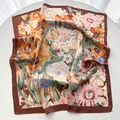 Detailed macro view of vintage floral print on elegant faux silk square scarf with satin finish - 65cm x 65cm / Coffee