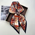 Elegant silk-like long scarf with equestrian horse print in a luxury gift box display - Off-white & Orange Equestrian Chain Style 5