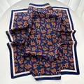 Vintage navy blue paisley silk scarf featuring orange floral patterns and pink borders - Blue