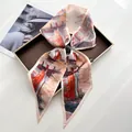 Artistic oil painting silk scarf with architectural print tied in a bow on tray - Oil Painting Landscape Red Sailboat Art Style (Style 15)