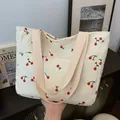 Sac fourre-tout en velours côtelé blanc cassé avec imprimés cerises et anses roses - Cerise