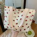 Sac fourre-tout en velours côtelé blanc avec imprimés fraises et anses roses - Fraise