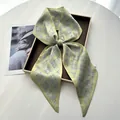 Elegant fruit green silk ribbon scarf with subtle plaid pattern tied in a stylish bow - Fruit Green Fine Grid Style (Style 21)