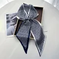 Blue and white silk scarf with geometric prints displayed on a brown tray for spring styling - Dark Blue & White Geometric Pattern Ribbon Style (Style 22)