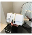 White faux crocodile skin crossbody bag with gold lock and chain strap detail - White