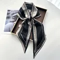 Elegant black and beige satin silk scarf with letter print on a decorative tray - Black White Champagne Color Block Inspirational Letter Style (Style 31)