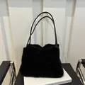 Elegant black faux fur tote bag for winter with soft plush texture and leather straps - Black