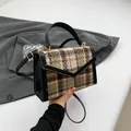 Retro tweed contrast handbag in brown and beige with black leather trim and gold buckle - Brown