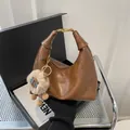 Brown semi-circle PU leather handbag with gold buckle and cute sheep charm on black box - With Pendant / Brown