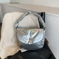 Metallic silver padded shoulder bag with fluffy down texture and minimalist flap closure - White