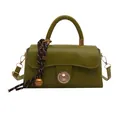 Olive green crossbody bag with woven pendant charm and gold twist lock in retro style - With Pendant / Grass Green