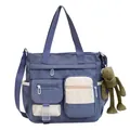 Blue and beige canvas tote bag with multi-pockets and green frog plush keychain pendant - Blue