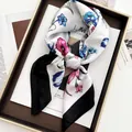 Detail of silk-feel square scarf with floral print and black border on fashion magazine - Black Border Colorful Floral Style (17)