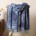 Detail of soft thick scarf with blue ethnic wave pattern and long fringed edges - Navy Blue