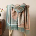 Detail of a thick double-sided shawl with abstract wave patterns and elegant fringe tassels - Emerald