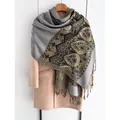 Ethnic paisley thick shawl scarf in grey and gold with fringe on a beige coat - Gray