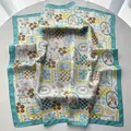 Detail of luxury silk square scarf with vintage mint green marine and palm tree prints - Emerald