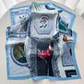Detail of elegant satin square scarf featuring vintage animal print and blue borders - Blue