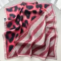 Detail of silk square scarf featuring pink leopard print and diagonal stripe patchwork - Pink