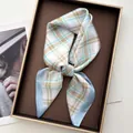 Elegant plaid silk scarf in blue and white displayed in a luxury gift box - Sky Blue