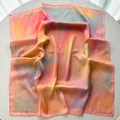 Elegant square faux silk scarf featuring a vibrant pink blue and yellow gradient ombre - Pink