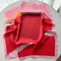 Detail of red and pink silk square scarf with floral print on white round table - 65cm x 65cm / Pink