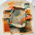 Elegant square scarf with abstract mountain river print in orange and green tones - Khaki